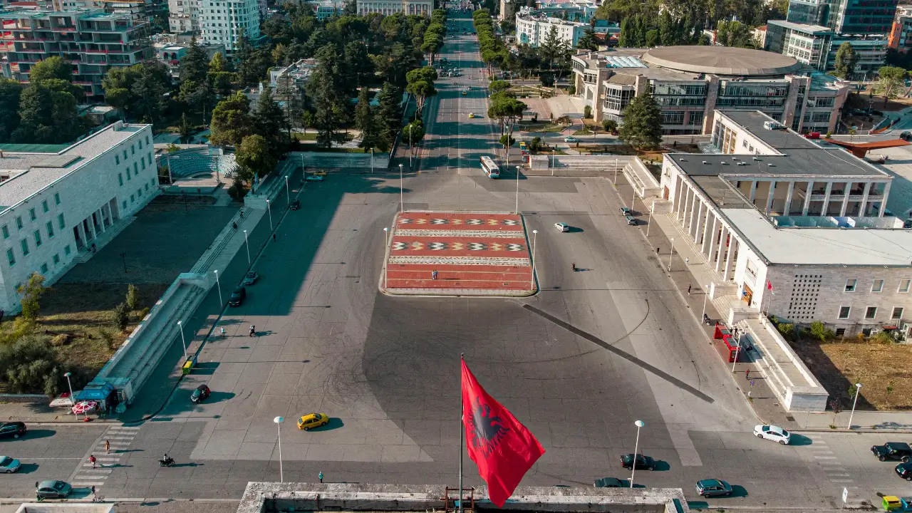 can foreigners buy property in albania