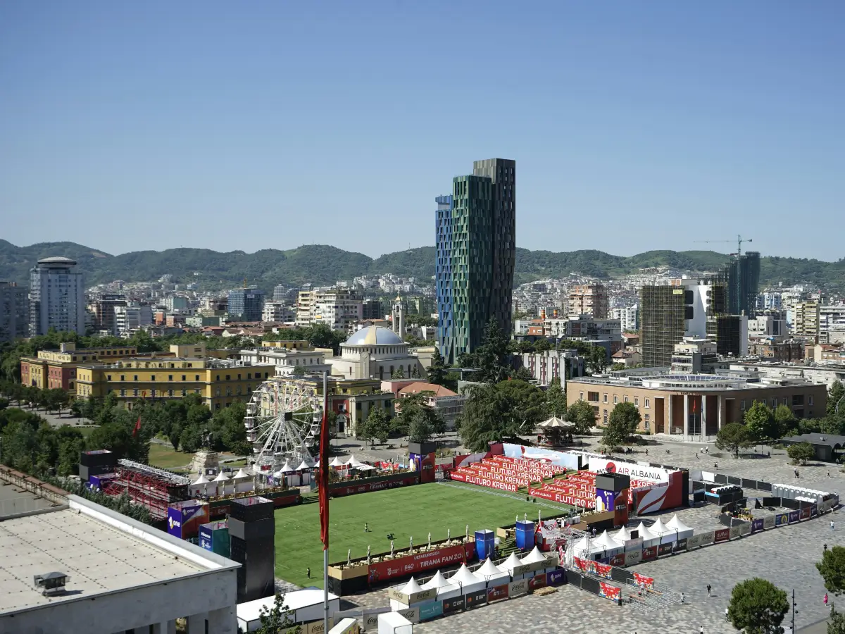 can foreigners own 100 percent of a company in albania