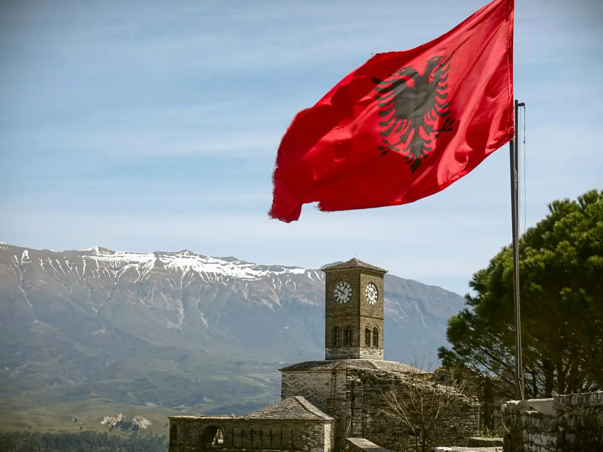 taxes for residents vs non residents in albania